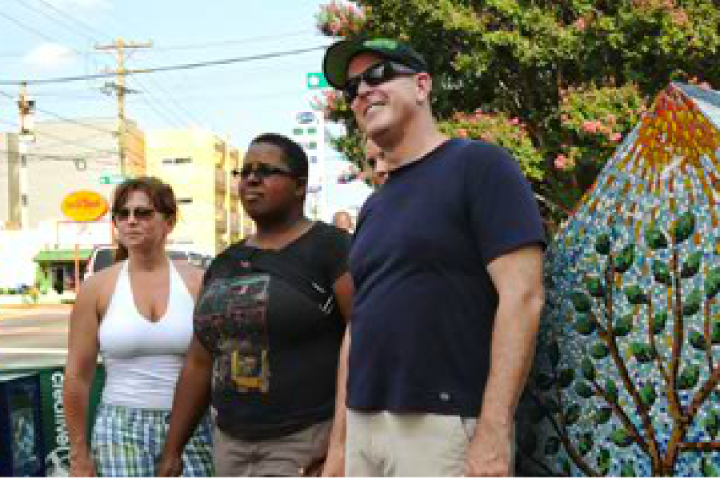 People smiling and enjoying the Center City Walking Tour in Charlotte NC