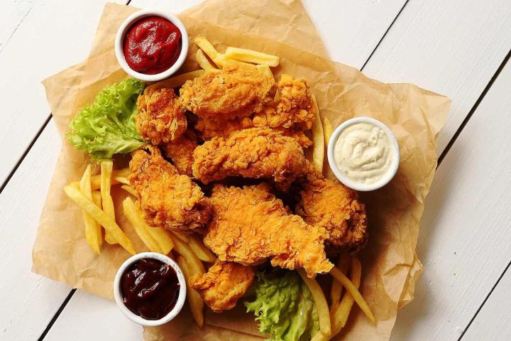 Fried chicken strips with fries