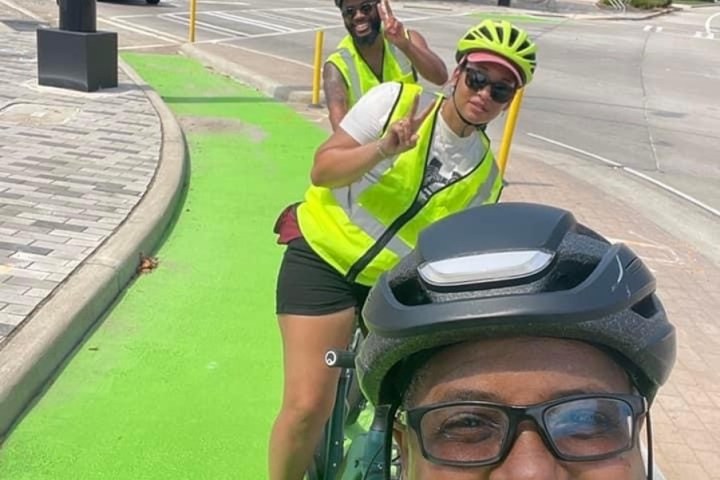 a woman wearing a helmet posing for the camera