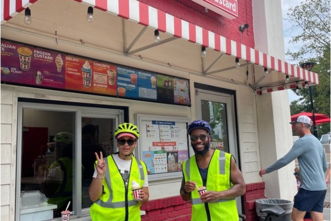 a group of people standing in front of a building