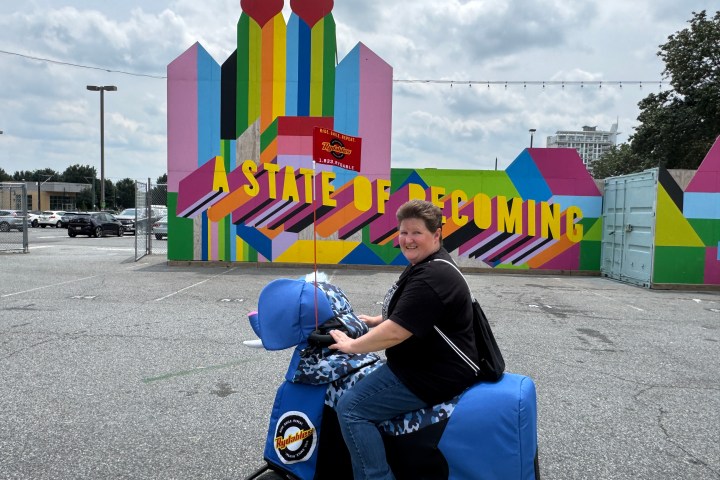 a man holding a kite