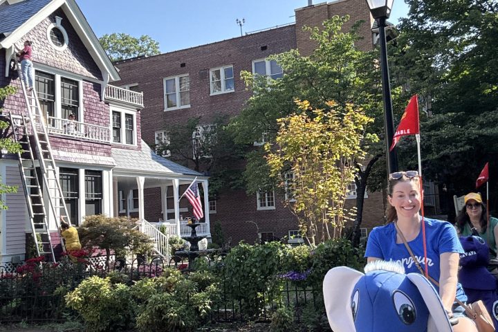 a group of people standing in front of a building